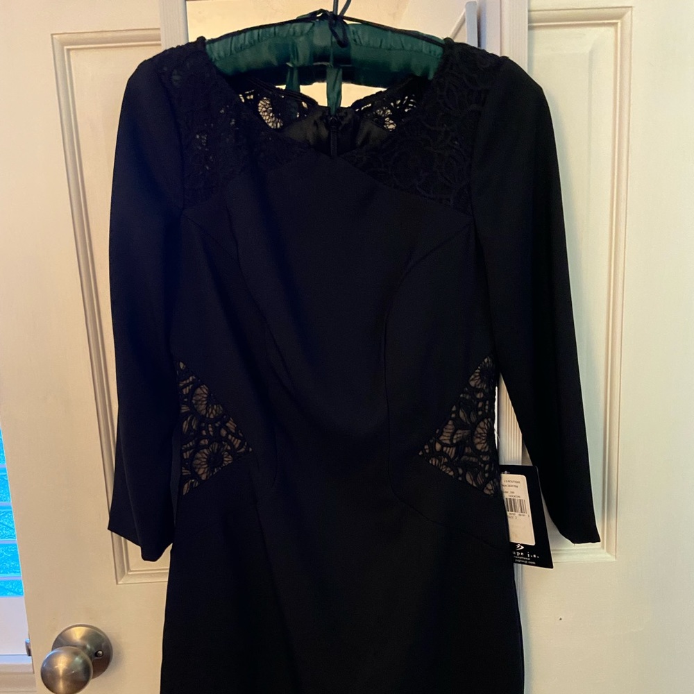 New with tags. Size 2 cocktail dress